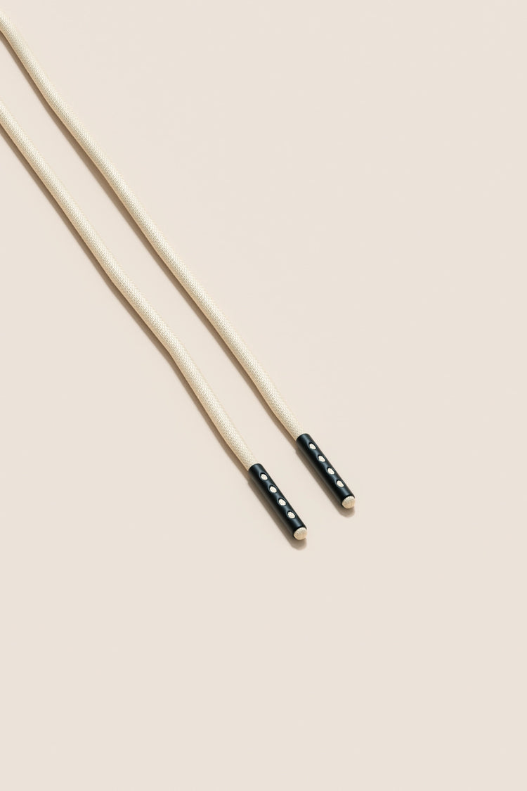 Senkels Cream 2.5mm Round Waxed Shoelaces with Black Matte Aglets